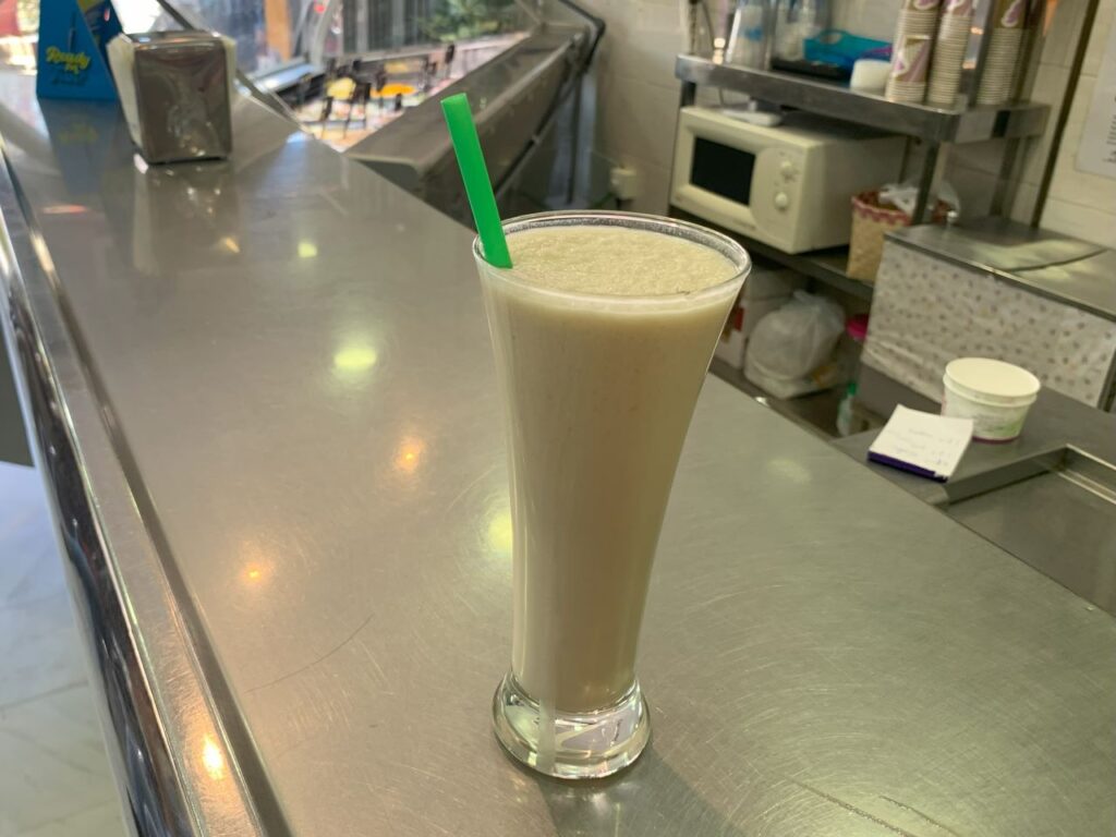 Spanish horchata drink over a ice cream shop counter