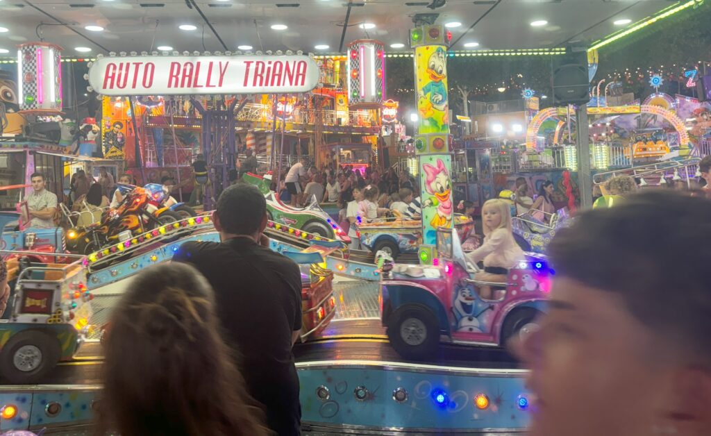 Feria de San Juan de Arroyo de la Miel Benalmadena 2024 - kids cars in the funfair