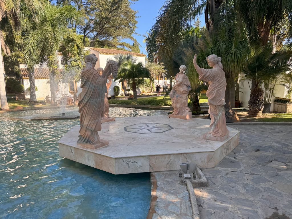 Four seasons' statues in the Molino de Inca Botanical Garden