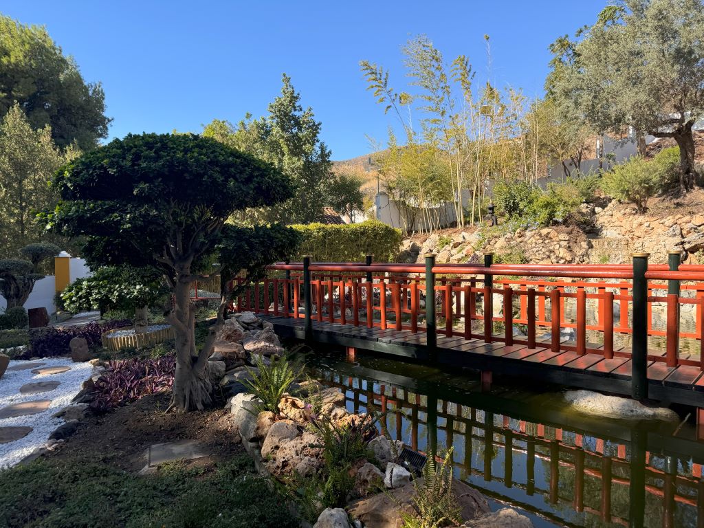 a bridge at the Japanese garden in the Molino de Inca Botanical Garden