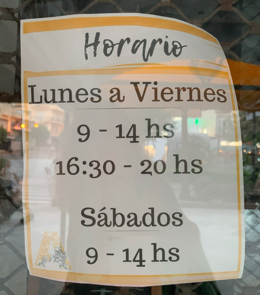 Siesta in Spain - opening hours on the doors