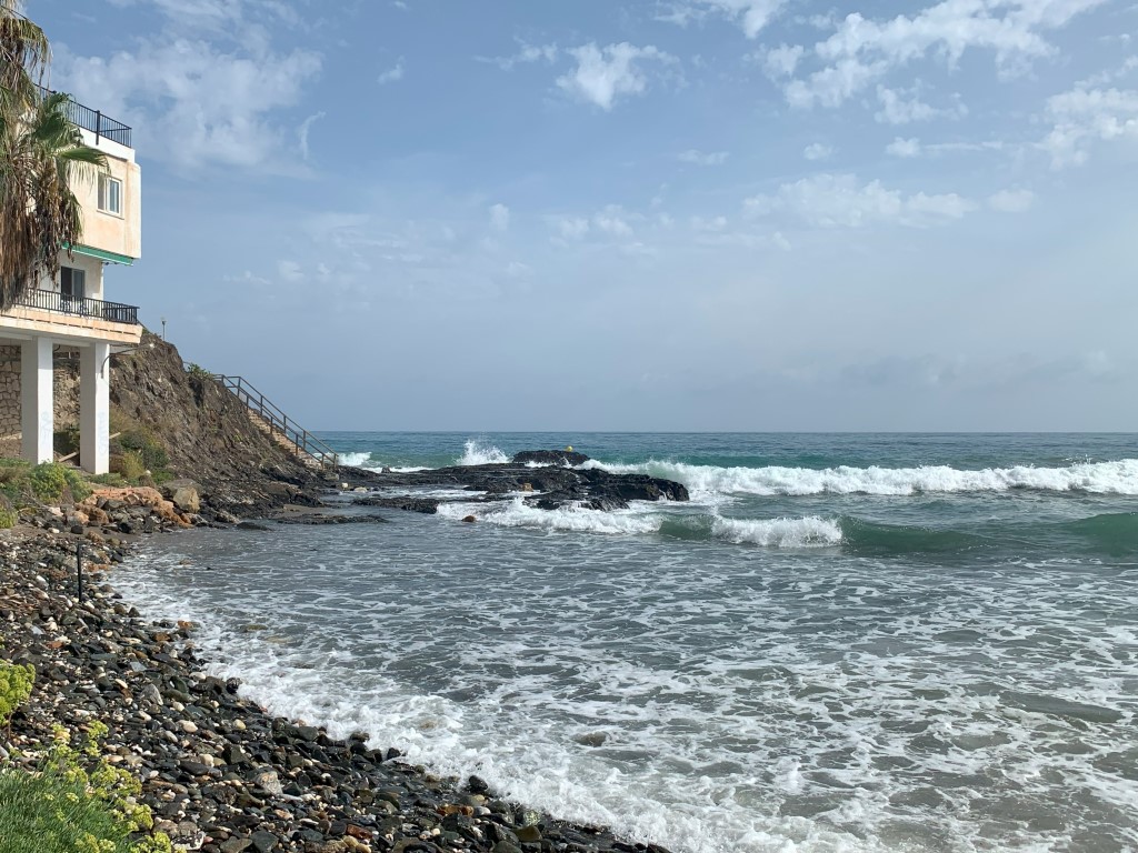 Train stations in Benalmadena: rocky beach in Torremuelle